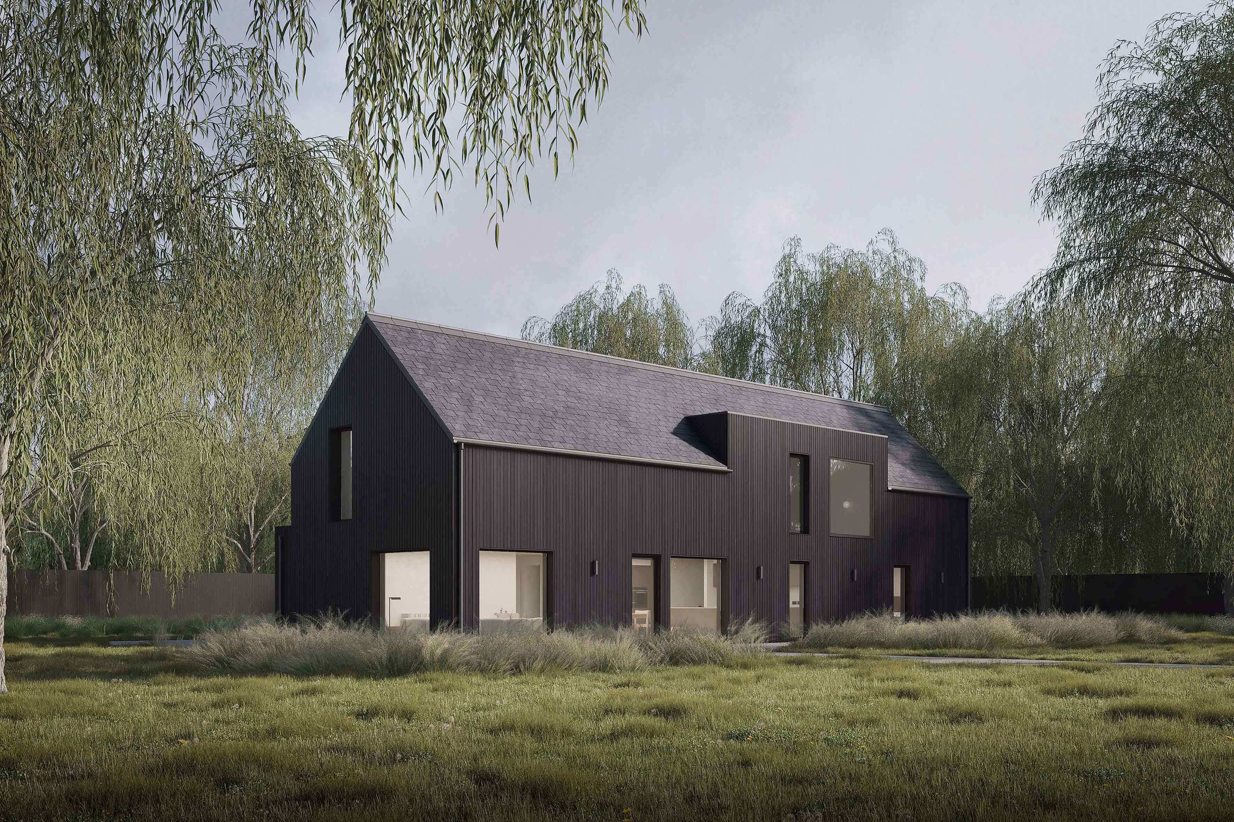 Exterior of the Coldwells Build Passivhaus, McKinley. Black clad prefabricated home, with large windows, pitched slate roof in a large garden with willow trees.
