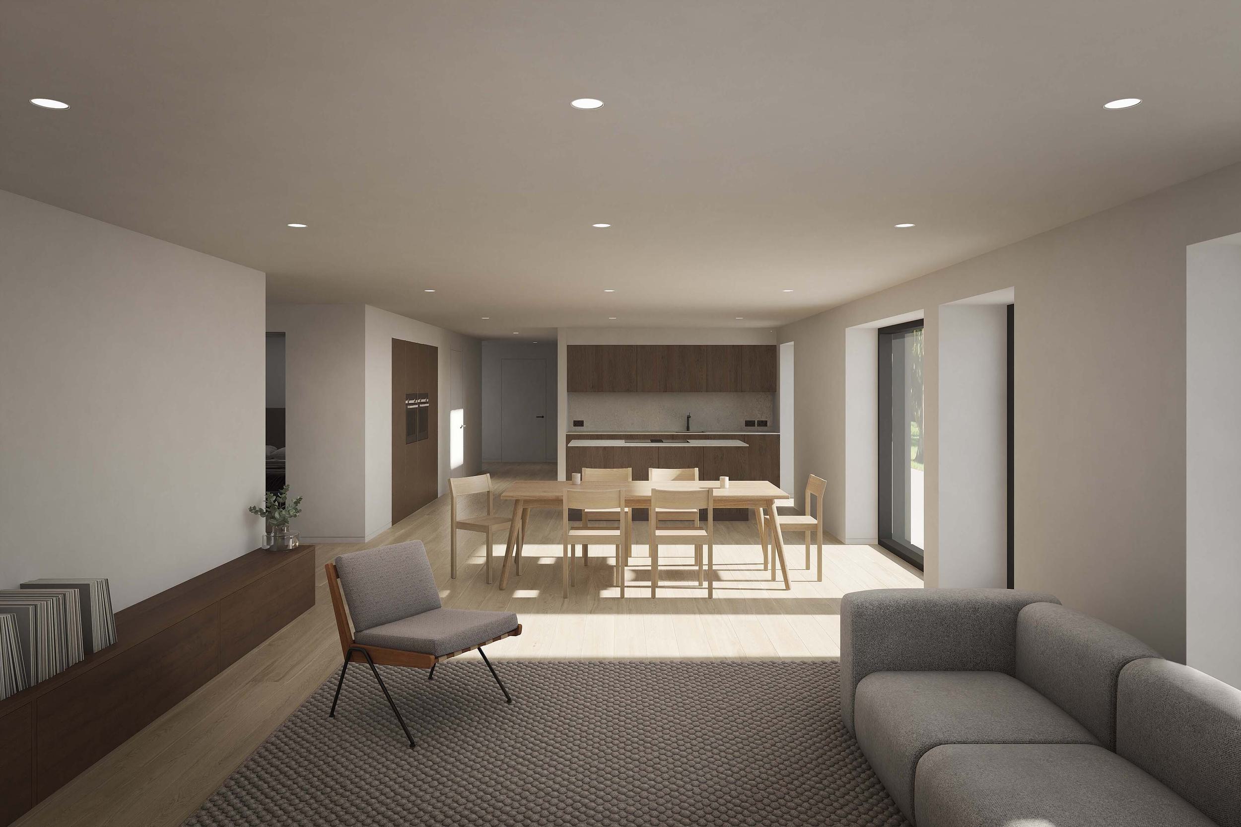 Living space and kitchen of the Coldwells Build Passivhaus, McKinley. Walnut kitchen cabinetry with large glazing, dining table and chairs and lounge chair.