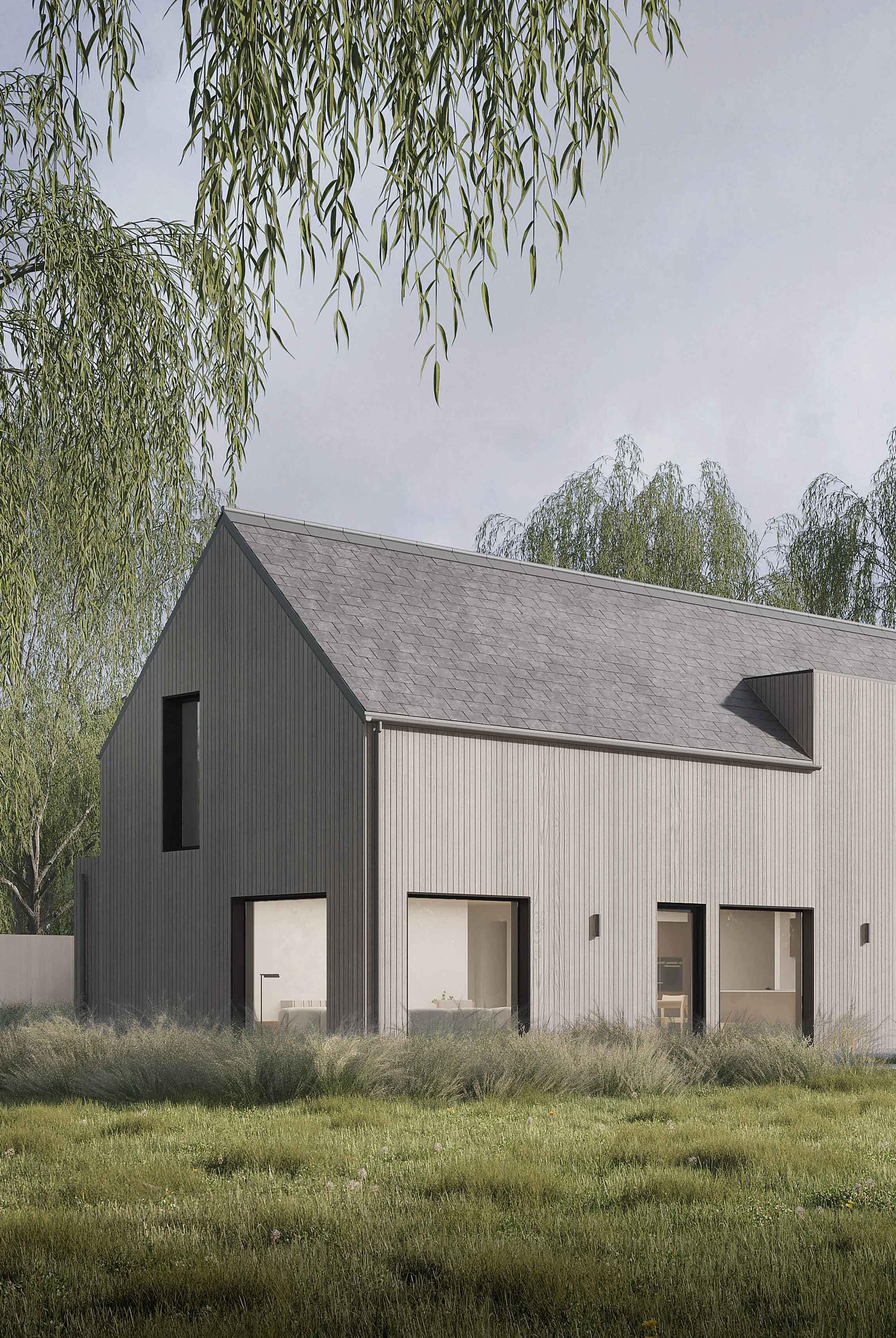 Exterior of the Coldwells Build Passivhaus, McKinley. Oak clad prefabricated home with large windows, pitched slate roof in a large garden with willow trees.