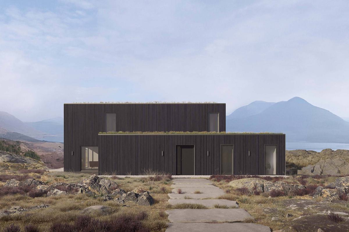 Exterior of the Coldwells Build Passivhaus, Thomson. Black clad prefabricated home with large windows, sedum roof and mountains in the landscape.